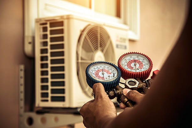 Professional Ac Installation technician working in Breedsville, MI